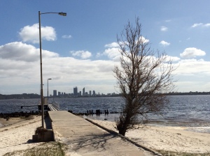 Applecross jetty, with Perth city skyline in the background
